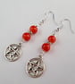Red and silver pentagram earrings - Image 2