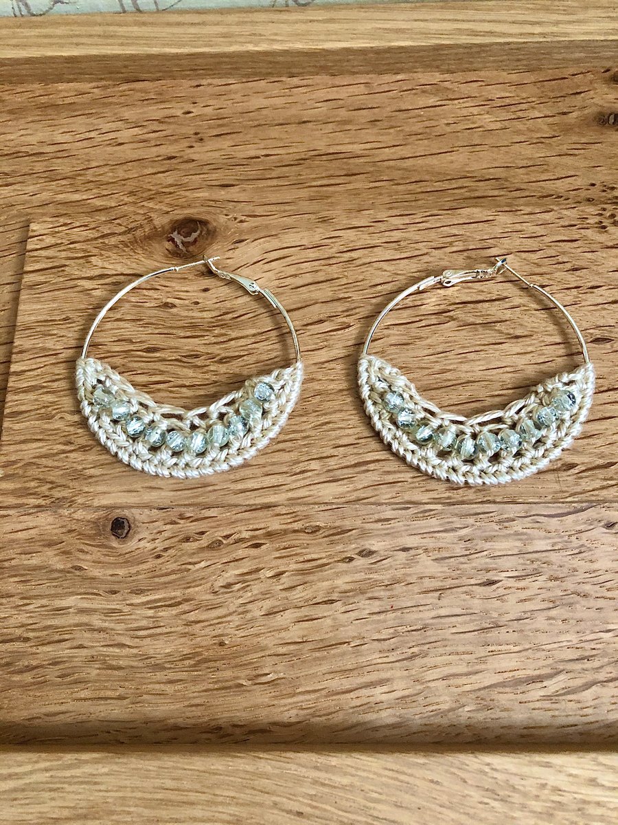 Hello April...silver plated hoop earrings with crochet and diamond design.