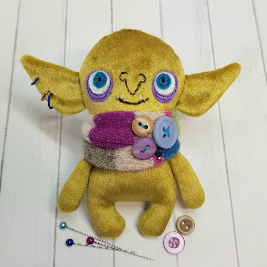 Goblin in Multi Scarf & Blue Eyes