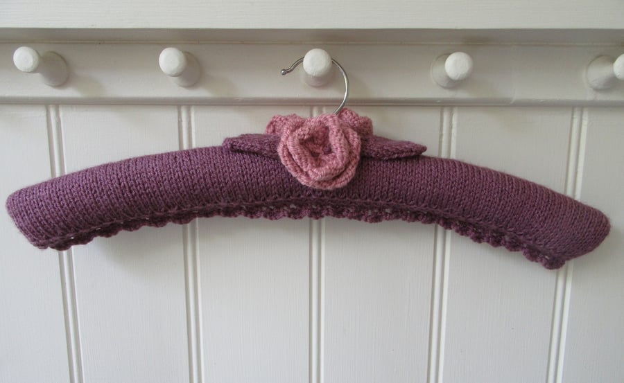 Hand knitted plum rose ladies coat hanger
