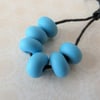 handmade lampwork blue tumbled spacer beads