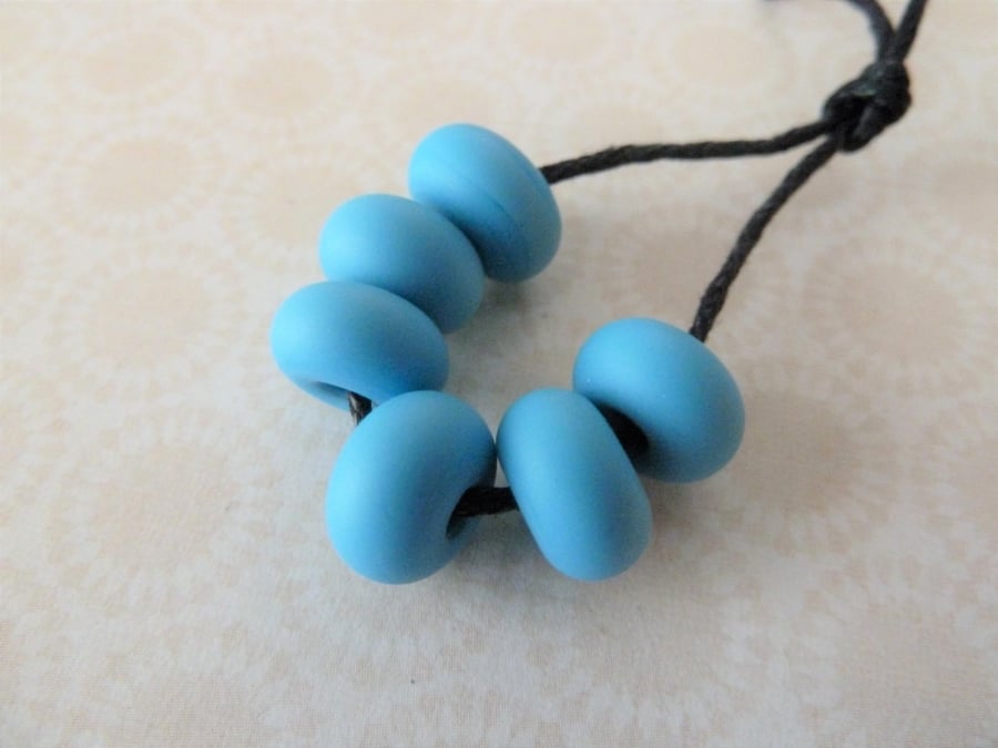 handmade lampwork blue tumbled spacer beads