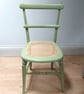 Antique chair in pale green chalk paint, re-caned seat, upcycled