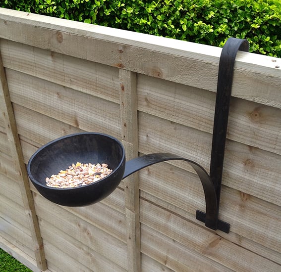 Rustic fence hanging bird feeder bowl in black