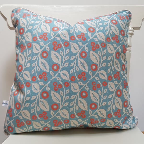 'Lucy' cushion in blue and coral 