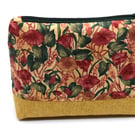 Great storage purse for home and away. Unusual floral print and toning base.