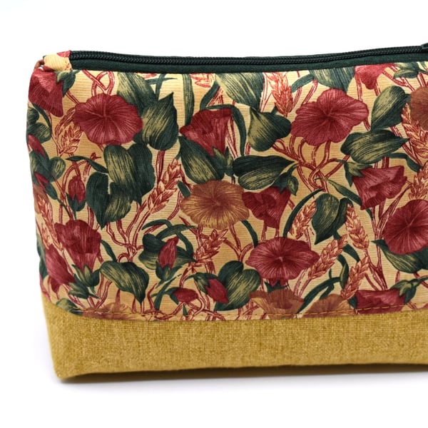 Great storage purse for home and away. Unusual floral print and toning base.