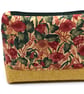 Great storage purse for home and away. Unusual floral print and toning base.