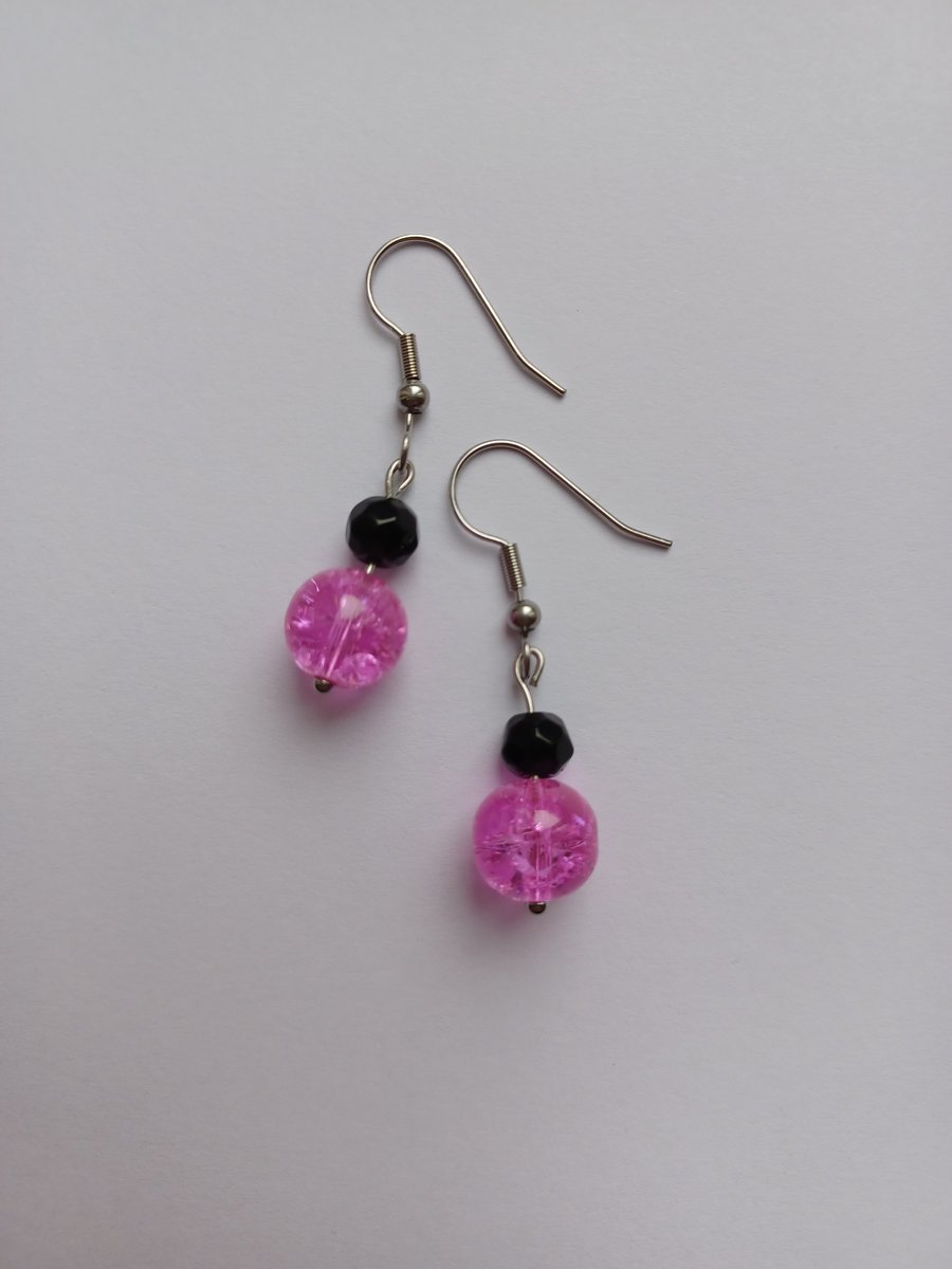 Bright pink crystal bead & black bead drop earrings