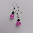 Bright pink crystal bead & black bead drop earrings