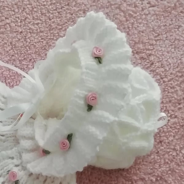 hand knitted frilled baby girl hat