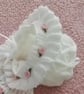 hand knitted frilled baby girl hat