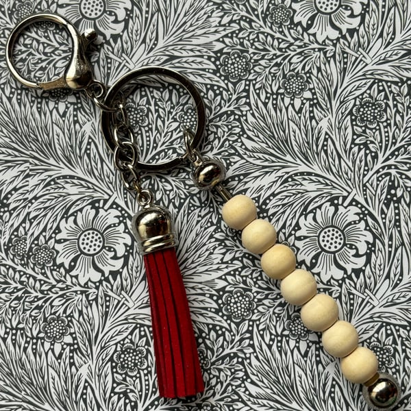 Wooden beaded keychain bag charm with red leather tassel