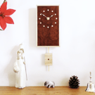 Rectangular Pendulum Wall Clock in burr madrone and sycamore with inlaid dots.