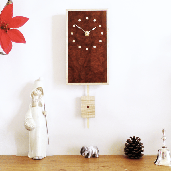 Rectangular Pendulum Wall Clock in burr madrone and sycamore with inlaid dots.