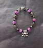 Elasticated skull and crossbones beaded bracelet 
