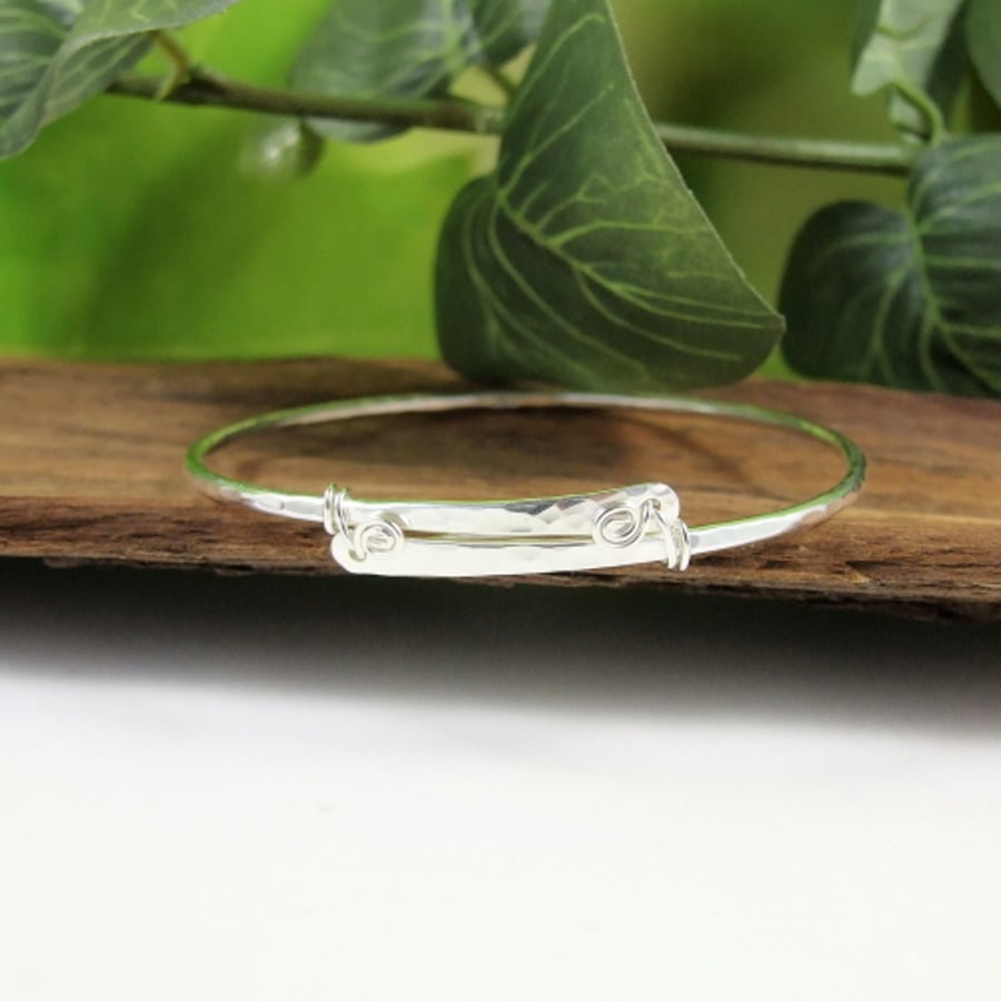 Sterling Silver Bangle in Overlap Design with Coils. Size Medium 20cms