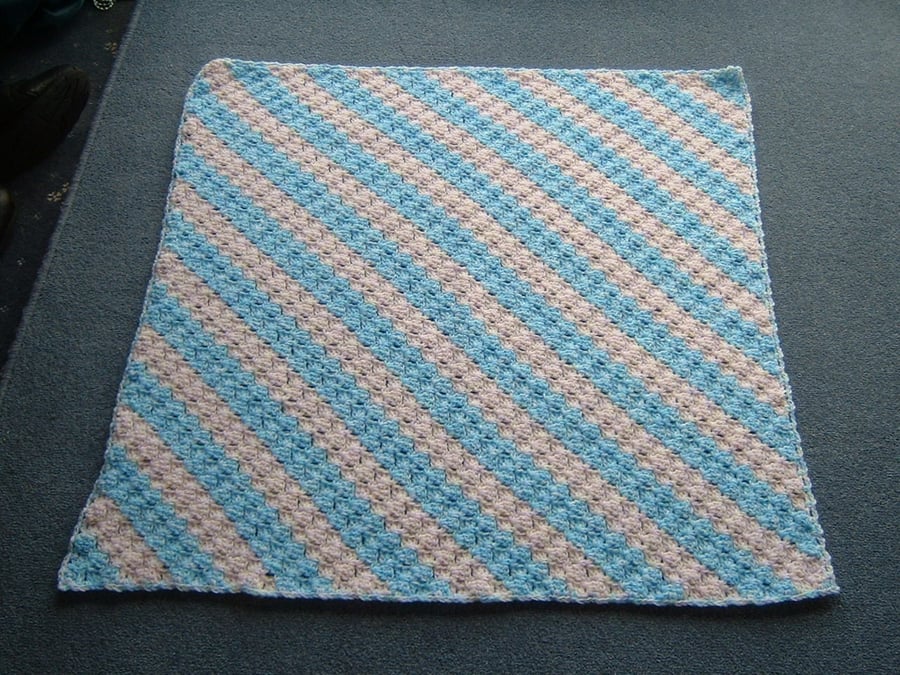 Crocheted baby blanket in pink and blue . ref 48094