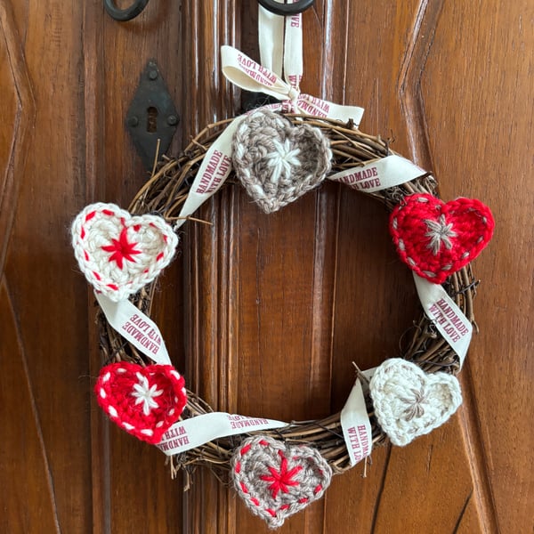 Scandi style Christmas wreath with crocheted hearts and ribbon 