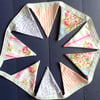 Mini (dresser) bunting in shades of pink and blue