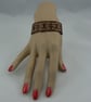 pyrographed leather bracelet featuring gate design - Image 3