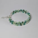 Handmade green crystal beaded bracelet with silver findings 