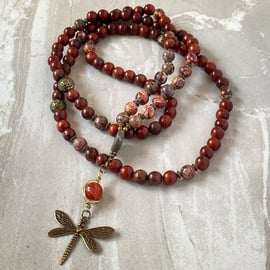 Rosewood and Leopard Skin Jasper Mala Necklace Featuring A Dragonfly