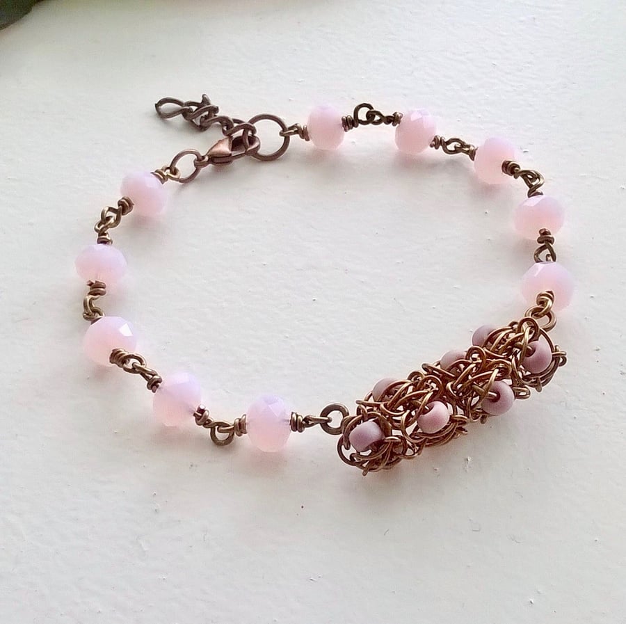 Knotty wire and pink crystal bracelet