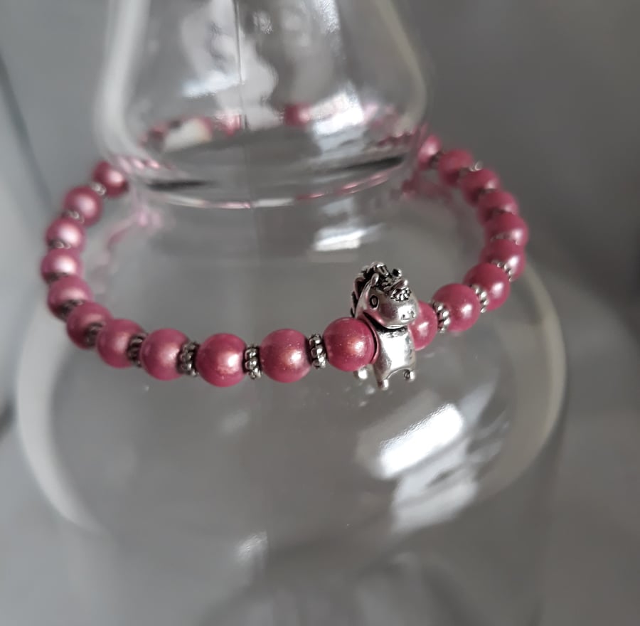 BR256 Pink miracle bead bracelet with unicorn