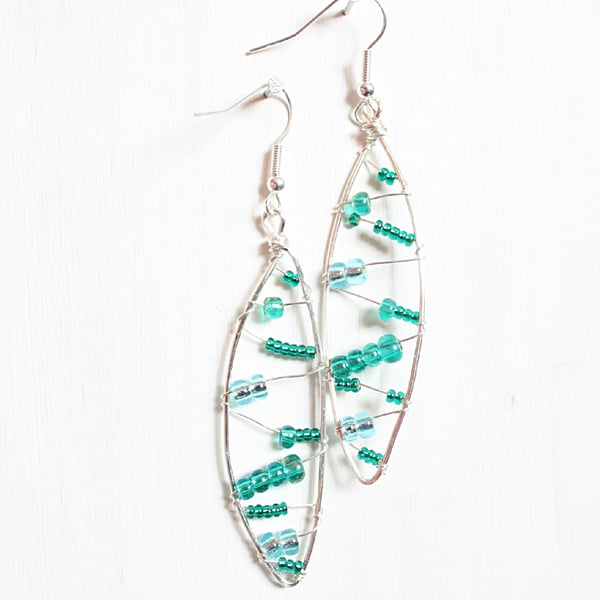 Leaf shaped silver wire wrapped drop earrings with green, blue and teal beads