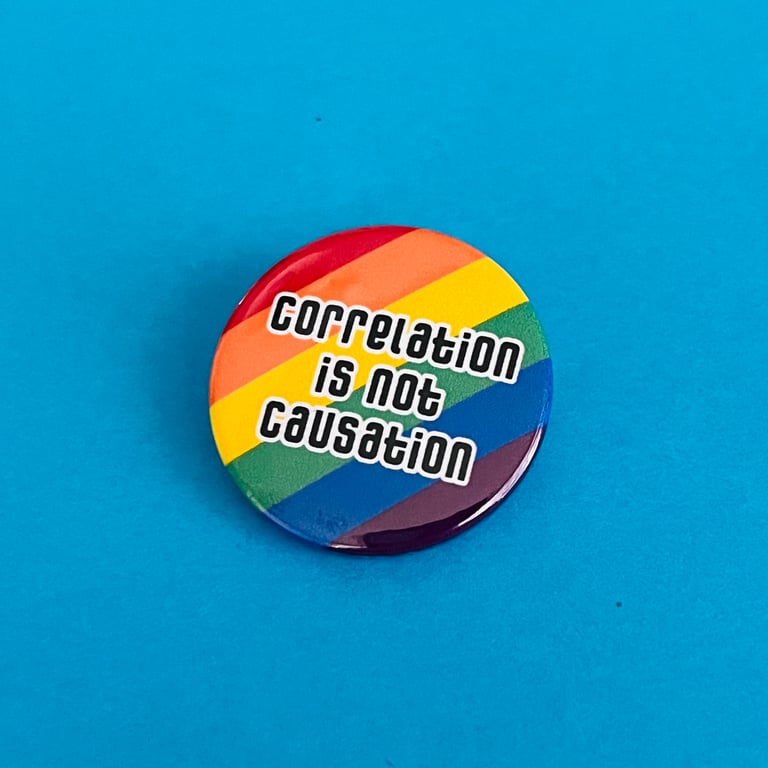Correlation is not causation badge, pocket pebble, magnet or keyring.