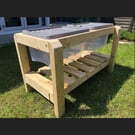 Sand Water Trays and Workbench for outdoor imaginative play.