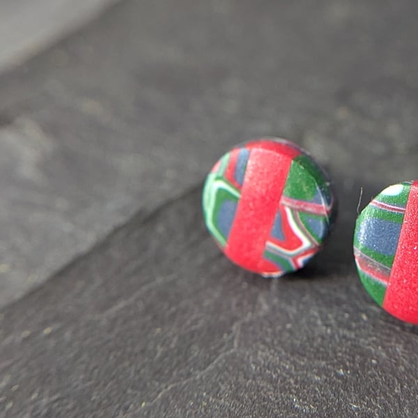 Red stud earrings with retro detail