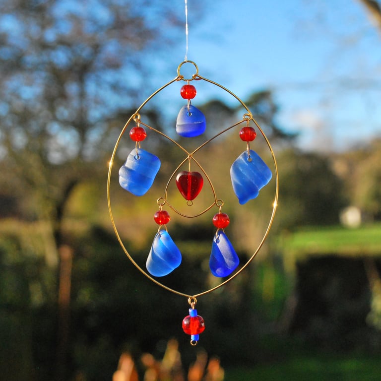 Blue sun catcher with red heart