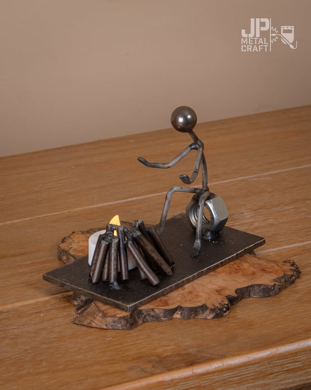 Campfire man candle holder