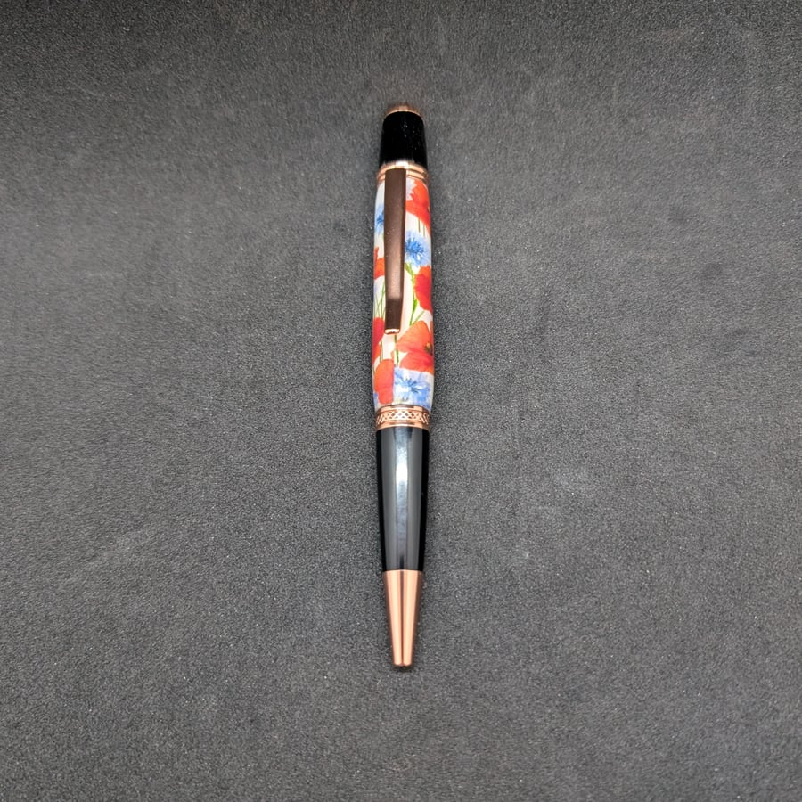 Lathe turned resin pen with images of poppy's and cornflowers 