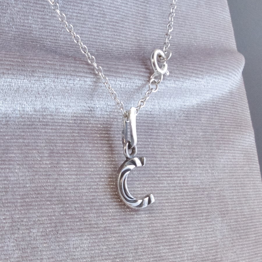 Initial Letter Pendant In Sterling Silver With Curved Black Zebra Stripes 