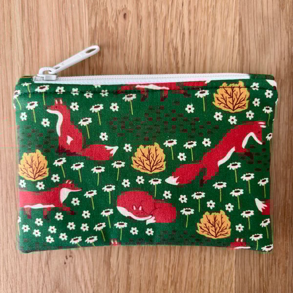 Small zipped fabric purse, pouch, make up bag, green with fun foxes print.