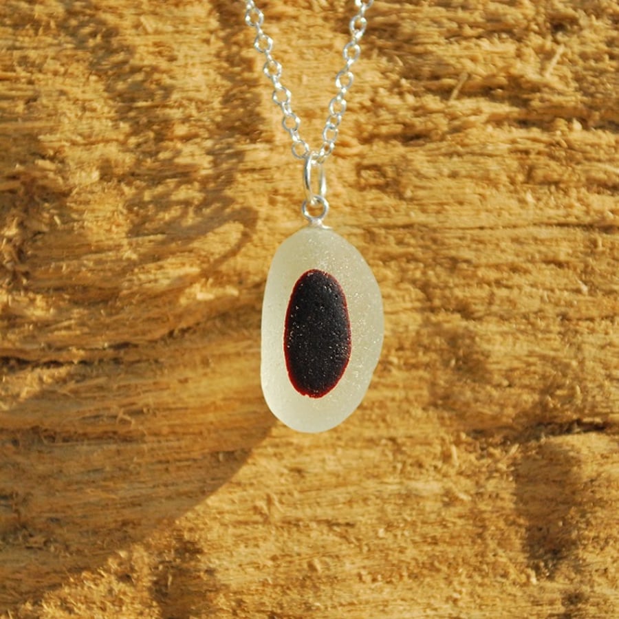 End of day sea glass pendant with deep red