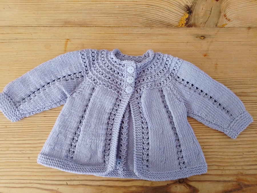 Baby cardigan handmade in lavender 100% merino wool for 3-6 months.