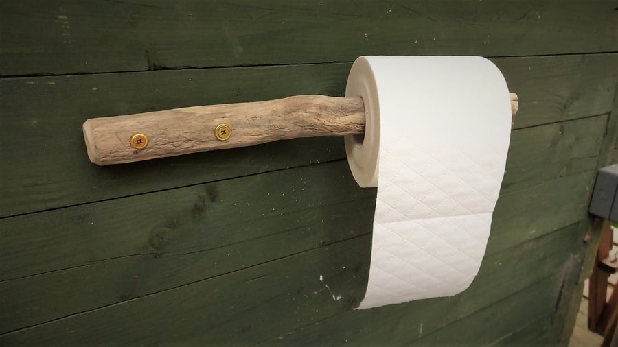 Rustic WC or bathroom toilet roll holder made from driftwood found in Cornwall 