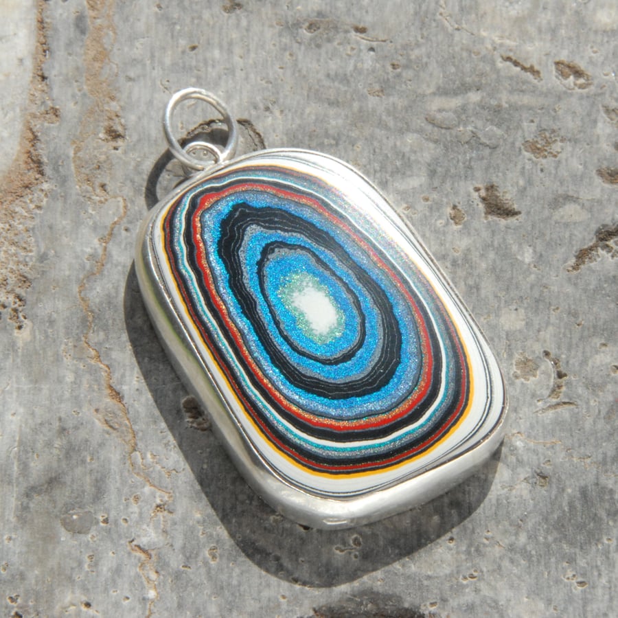 Harley fordite and sterling silver pendant