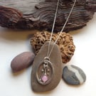 Sterling Silver Pendant. Oval Ring with stamen detail and Rose Quartz bead