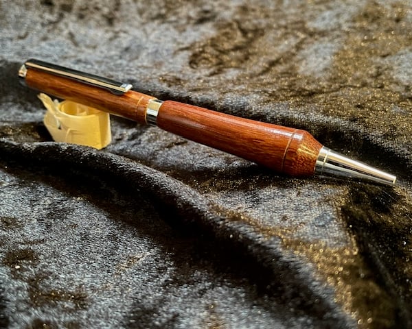 Wooden pen with silver plate fittings