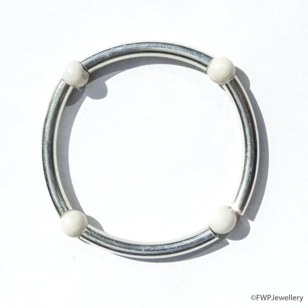 Silver Tube Bracelet with four Bone Beads