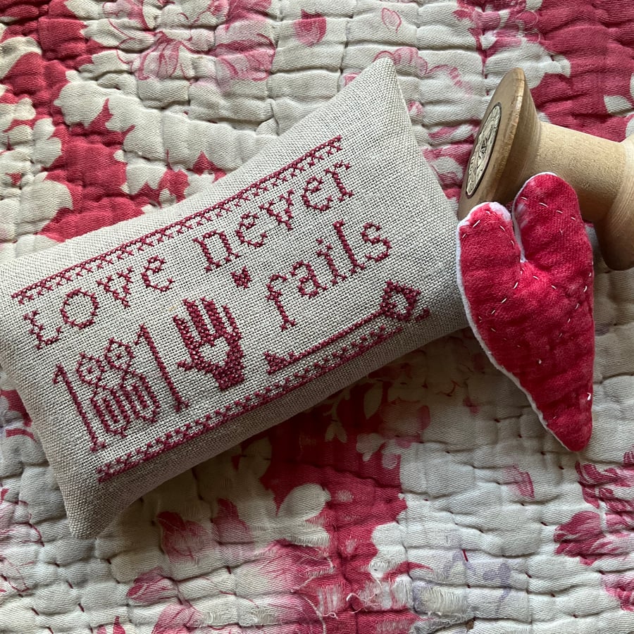 Love Never Fails - lavender filled cross stitch