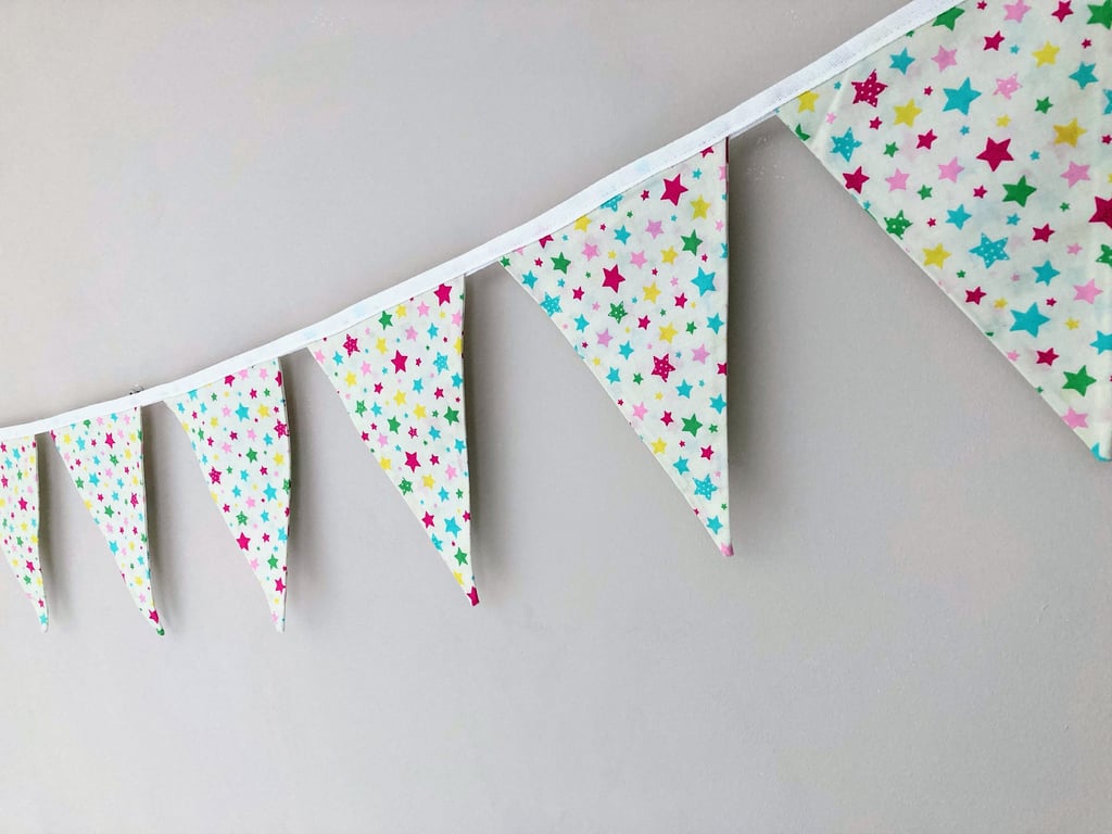 Multicoloured Stars on Cream Double Sided Cotton Fabric Bunting.