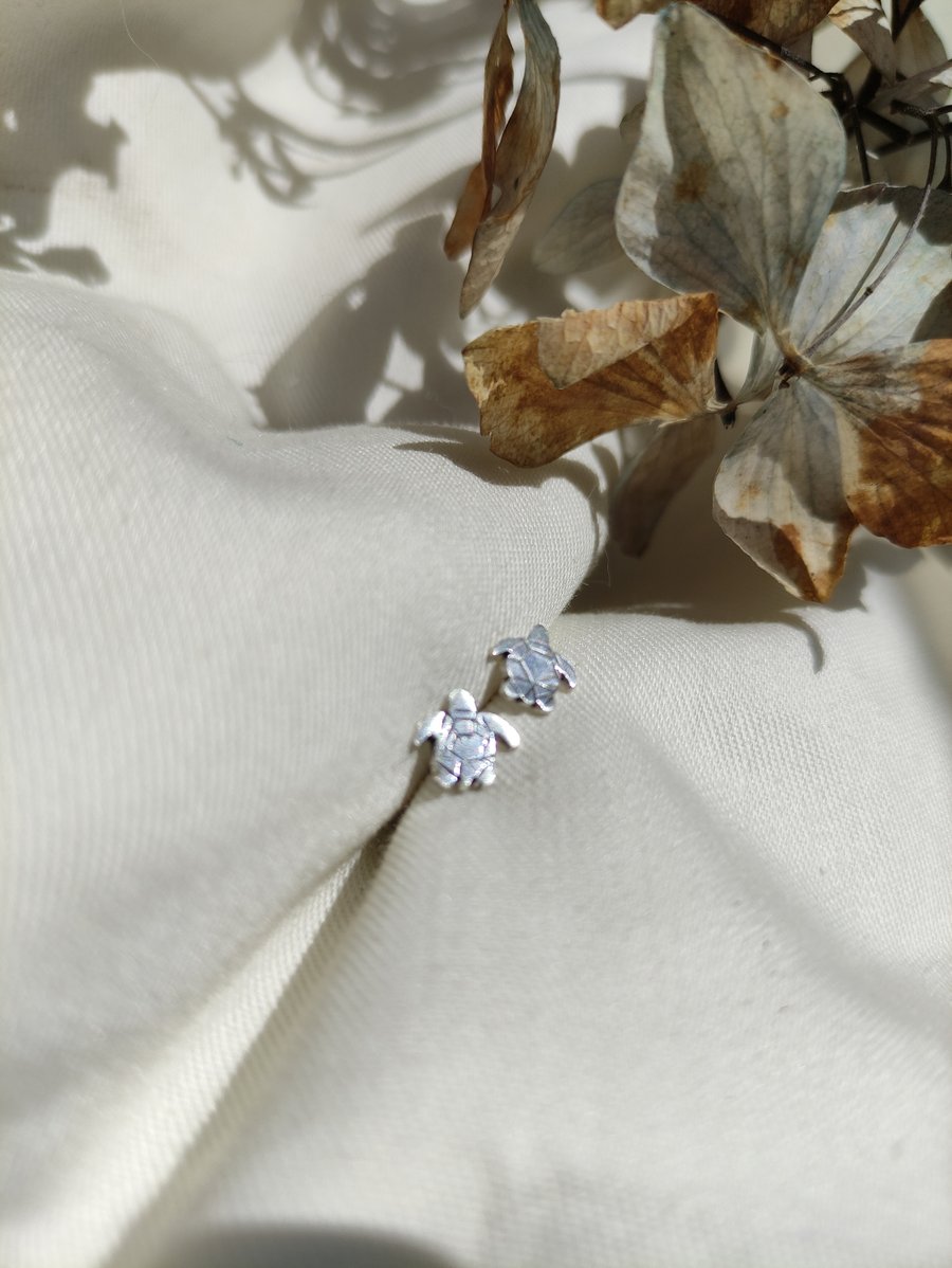 Tiny sea turtle studs in eco silver