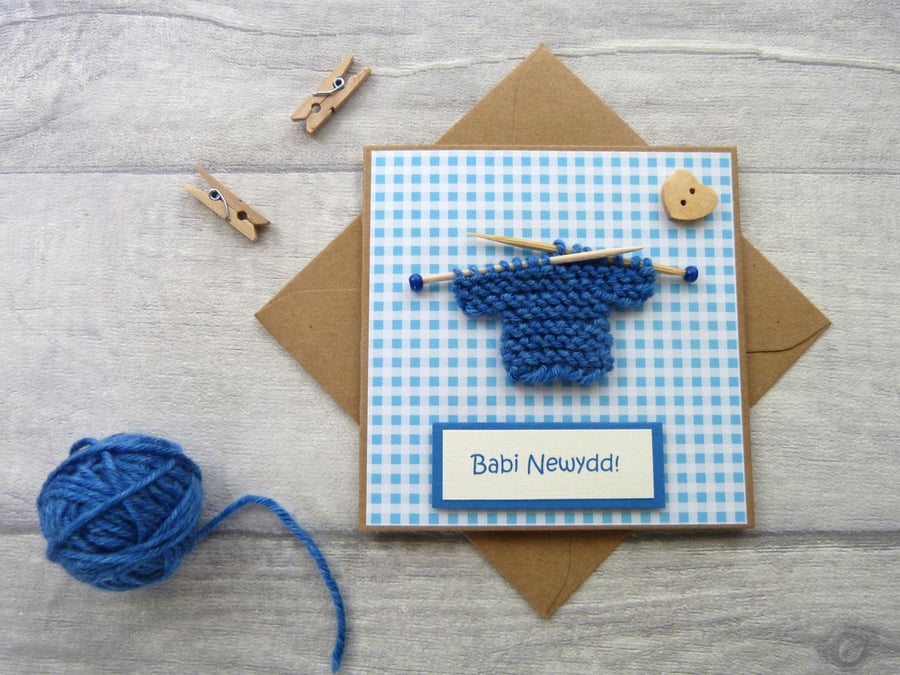 Babi Newydd Small New Baby Card with little knitted jumper in Welsh 4" x 4"
