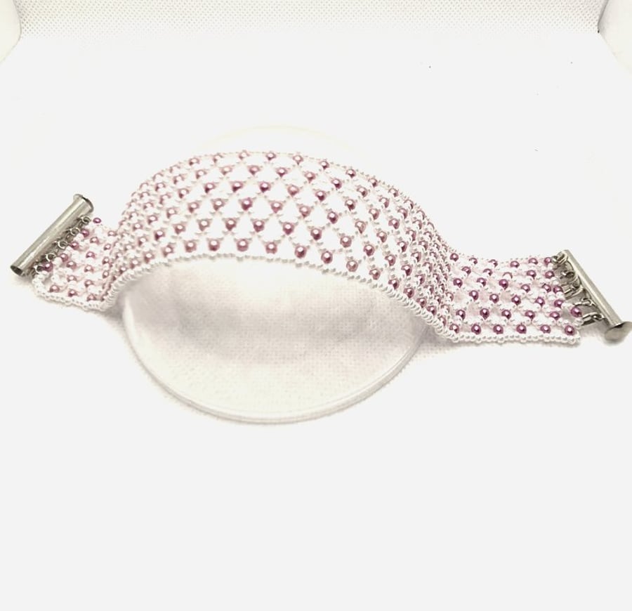 White netted bracelet with pink Swarovski pearls